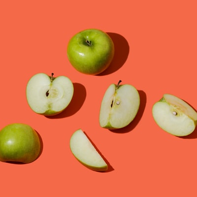 On the surface of the pink green apple fruit
